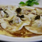 Ravioli of slow baked Karoo lamb shoulder with sage butter and parmesan cheese hr